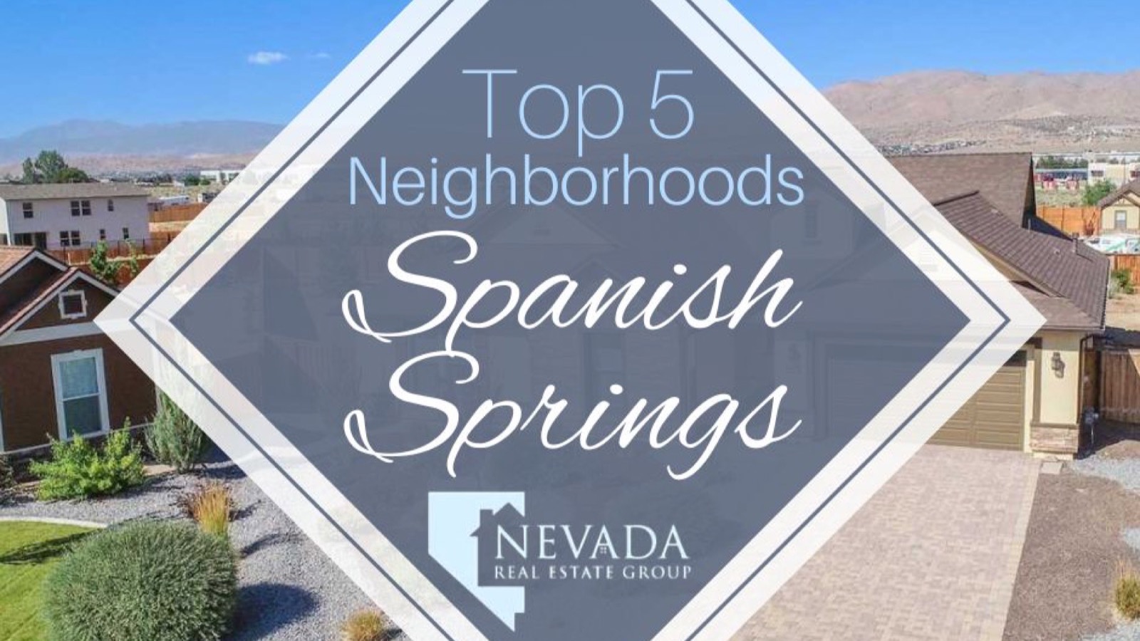 New-construction Sparks Nevada neighborhood with contemporary homes and the Sierra Nevada foothills behind